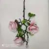 زهور القرنفلية المصنوع من القرنفل، مزخرفة بزهور مزيفة في غرفة المعيشة details Picture